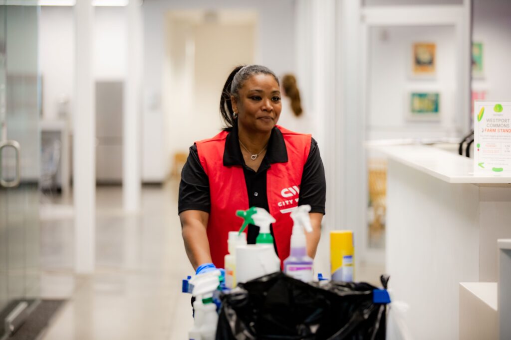 Day porter with janitorial cart.